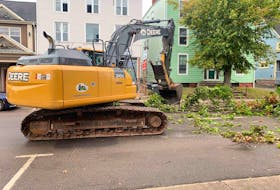 The City of Charlottetown has called in contractors such as Island Coastal Ltd.to use heavy machinery, shown here on Kent Street on Sept. 27, to help clear streets of trees and debris destroyed by post-tropical storm Fiona. Dave Stewart • The Guardian