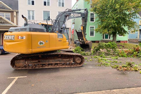 The City of Charlottetown has called in contractors such as Island Coastal Ltd.to use heavy machinery, shown here on Kent Street on Sept. 27, to help clear streets of trees and debris destroyed by post-tropical storm Fiona. Dave Stewart • The Guardian