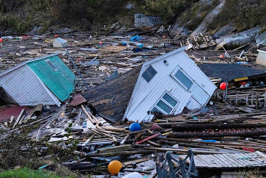 Houses float in the water in the aftermath of Hurricane Fiona in Rose Blanche, Newfoundland. Damages will likely produce record insured losses in Atlantic Canada. 