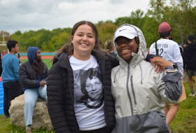 Gabby Strickey, 18, from Windsor, and Adaoma Ukaegbu, 16, from Nigeria, were all smiles as they awaited the start of the Terry Fox Run on Sept. 18.