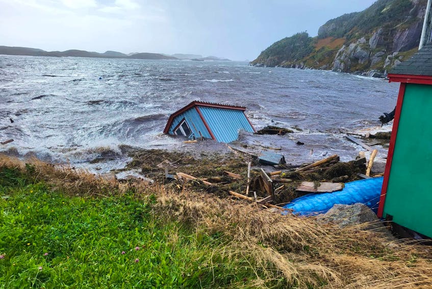 Another shed floats on its side after being swept into the ocean in Ramea during post-tropical storm Fiona on Saturday, Sept. 24. – Image From Facebook