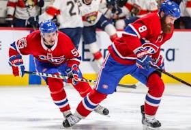 Montreal Canadiens Victor Mete, left, teams up on defence with Jordie Benn during second period against the Florida Panthers in Montreal on Sept. 29, 2017. 