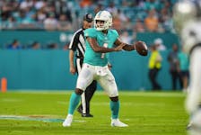 Tua Tagovailoa #1 of the Miami Dolphins attempts a pass during the first half against the Las Vegas Raiders at Hard Rock Stadium on August 20, 2022 in Miami Gardens, Florida.
