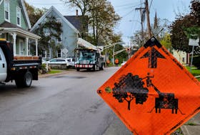 Crews from New Brunswick work to clear downed trees on Euston St. in Charlottetown on September 28, 2022. Maritime Electric's outage map was showing close to 57,000 Island households were still without power, five days after the storm, due to a high number of poles that were knocked over during post-tropical storm Fiona.