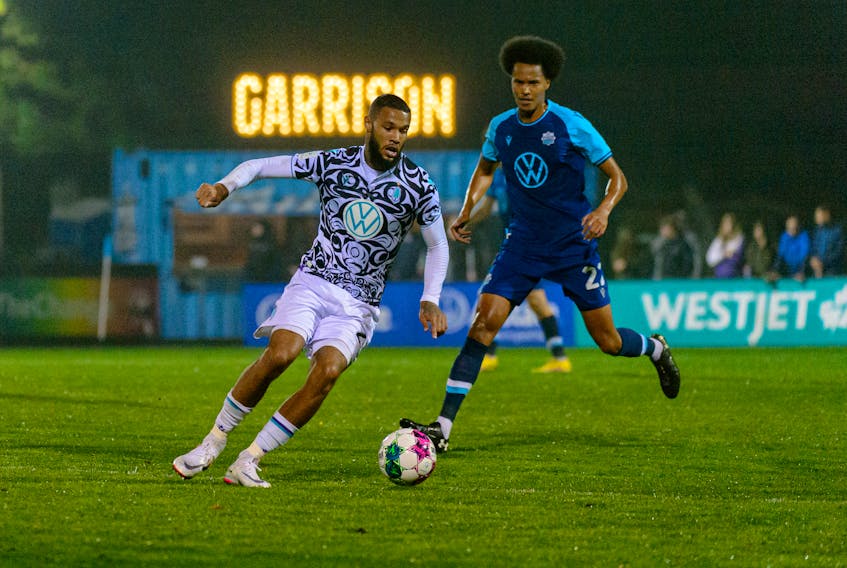 HFX Wanderers midfielder Mo Omar (right) defends against Pacific FC during Canadian Premier League action Tuesday night at the Wanderers Grounds. - TREVOR MacMILLAN / HFX WANDERERS