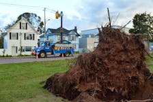 A Newfoundland Power crew works to energize a portion of Kent Street in Charlottetown Sept. 28. Alison Jenkins • The Guardian