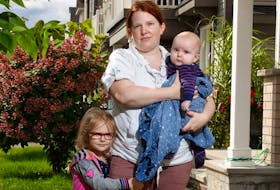 Melanie Raymond with her kids Alice, almost four, and four-month-old Billy, outside her home in Ottawa. Raymond has had a lot of trouble finding pain medication for her kids due to the shortage. 