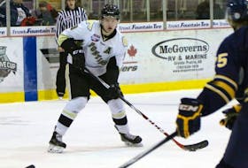 Bobby McMann, of the Bonnyville Pontiacs, looks for a pass in the offensive zone against the Grande Prairie Storm, in AJHL action,  on Saturday October 24, 2015 at Revolution Place in Grande Prairie, Alta.  