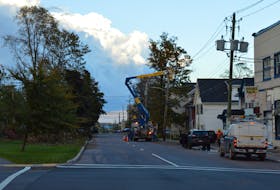 A Newfoundland Power crew works to restore power in Charlottetown Sept. 28. Alison Jenkins • The Guardian