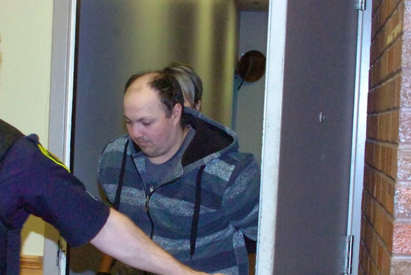 Rosie Mullaley/The Telegram
Matthew Kerr of Torbay, who is facing his second set for child pornography charges, is led into Courtroom No. 7 at provincial court in St. John's Monday.  Matthew Kerr at St. John's Provincial Court in 2016. — File Photo