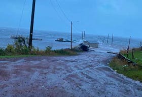 Water washes over the wharf in Lennox Island in the wake of post-tropical storm Fiona. Chief Darlene Bernard says the reserve is in the process of replacing the wharf and damage from Fiona may speed up this process. Colin MacLean • SaltWire Network