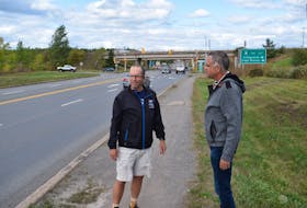 Tony Corbin and Councillor Andy Thompson talk about the need for a sidewalk in Blue Acres.