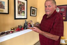 Former New Glasgow fire chief Doug Dort started collecting firefighting memorabilia decades ago and has amassed quite a collection including scale replicas of the fire trucks lost in Sept 11, 2001 attack on the World Trade Centre. Rosalie MacEachern