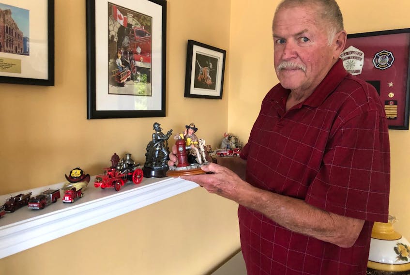 Former New Glasgow fire chief Doug Dort started collecting firefighting memorabilia decades ago and has amassed quite a collection including scale replicas of the fire trucks lost in Sept 11, 2001 attack on the World Trade Centre. Rosalie MacEachern