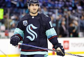 Matty Beniers of the Seattle Kraken warms up before the game against the San Jose Sharks at Climate Pledge Arena on April 29, 2022 in Seattle, Washington.  