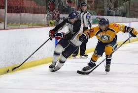 Valley Wildcats right-winger Ethan Kearney, left, tries to beat Yarmouth Mariners forward Jonny Park Sept. 3 during Valley’s first pre-season game of the 2022-23 campaign. The Wildcats won the contest 2-1 at the Kings Mutual Century Centre in Berwick.