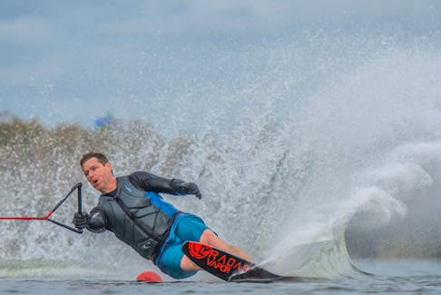 Johnny Hayward carves water during a slalom training run in Florida.-  Spencer Shultz