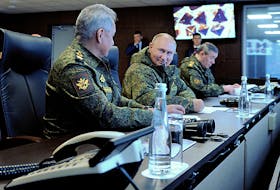 Russian President Vladimir Putin (C), Defence Minister Sergei Shoigu (L) and Chief of the General Staff of Russian Armed Forces Valery Gerasimov oversee the Vostok-2022 (East-2022) military drills at Sergeyevsky training ground in the far eastern Primorsky Region, Russia September 6, 2022. Sputnik/Mikhail Klimentyev/Pool via REUTERS  Russian President Vladimir Putin, centre, Defence Minister Sergei Shoigu, left,  and Chief of the General Staff of Russian Armed Forces Valery Gerasimov oversee the Vostok-2022 (East-2022) military drills at Sergeyevsky training ground in the far eastern Primorsky Region of Russia on Tuesday. Sputnik/Mikhail Klimentyev/Pool via REUTERS