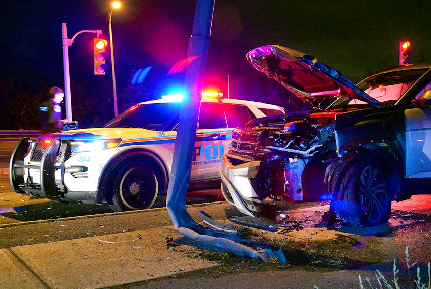 One man was taken into custody after crashing his SUV into a pole in St. John's late Tuesday night. Saltwire staff