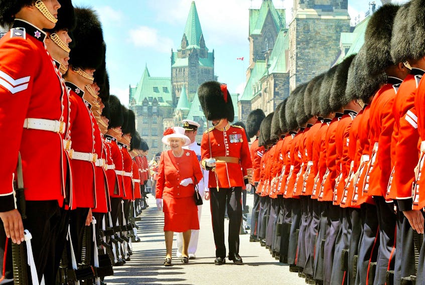 OTTAWA, ON - JULY 01:  Queen Elizabeth II inspects a Guard of Honour outside the Canadian Parliament, after arriving to attend the Canada Day celebrations on July 1, 2010 in Ottawa, Canada. The Queen and Duke of Edinburgh are on an eight day tour of Canada starting in Halifax and finishing in Toronto. The trip is to celebrate the centenary of the Canadian Navy and to mark Canada Day. On July 6th the Royal couple will make their way to New York where the Queen will address the UN and visit Ground Zero.  (Photo by John Stillwell - Pool/Getty Images)