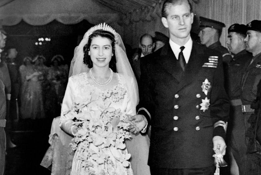 Princess Elizabeth of England and Prince Philip are seen on their wedding day 20th November 1947, in London. (Photo by CENTRAL PRESS / AFP) (Photo by -/CENTRAL PRESS/AFP via Getty Images)