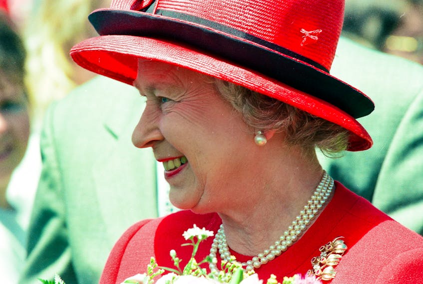 Queen Elizabeth II smiles as she greets people during her royal visit to Newfoundland in June 1997 as part of the Cabot 500 celebrations. Keith Gosse • Telegram file photo