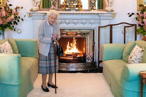 Queen Elizabeth waits in the drawing room at Balmoral Castle in Scotland, before receiving Liz Truss for an audience, where the newly elected leader of the Conservative party would be invited by the Queen to become prime minister and form a new government, Tuesday, Sept. 6, 2022. - Jane Barlow / Pool via Reuters