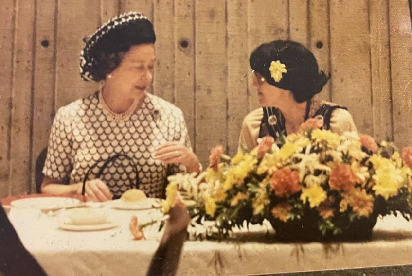 Queen Elizabeth II chats with then St. John’s mayor Dorothy Wyatt during a lunch in St. John’s in 1977. - Contributed