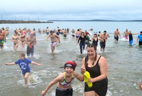 A total of 94 registered participants took the plunge into Morien Bay for the 10th anniversary of the Port Morien Polar Dip, held on New Year's Day. This was the first time since 2020 the event was held in person at Port Morien.