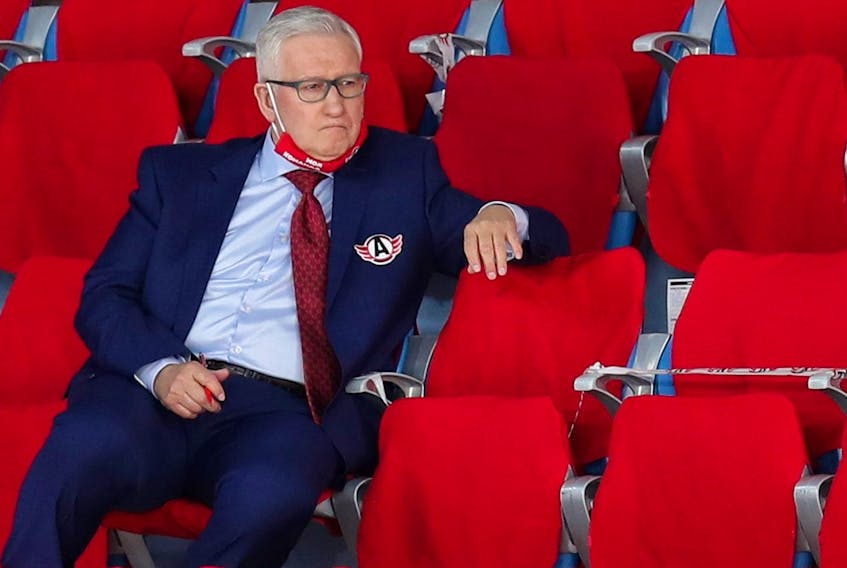 Perry Pearn, then-assistant to the head coach of HC Avtomobilist Yekaterinburg, watches a game in 2020.