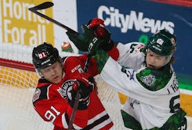 Quebec Remparts Nathan Gaucher and Halifax Mooseheads Zachary L'Heureux tangle during QMJHL action in Halifax Saturday April 9, 2022.

TIM KROCHAK PHOTO