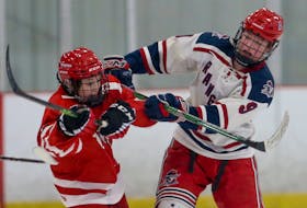 Truro Bearcats' Henry Thorne, left, collides with Rangers' Landon O'Grady during Under-15 Major action on the opening day of the Saltwire East Coast Ice Jam hockey tournament  in Bedford on Wednesday.