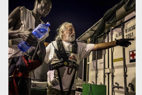 Gordie Hatt loves helping people. He is a Canadian Red Cross volunteer in Antigonish and has been on many Doctors Without Borders missions. Here he’s shown while on a mission on a Bourbon Argos ship, helping refugees get from the Mediterranean to Europe. FRANCESCO ZIZOLA