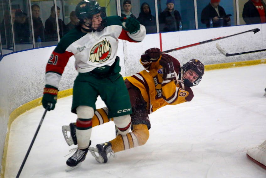 Sydney Rush's Ty Oliver takes a hit from Kensington Wild  Ryder Howatt during U18 action at the Ice Jam tourney in Bedford Friday January 13, 2023.

TIM KROCHAK PHOTO