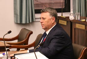 Premier Dennis King, at his desk in the P.E.I. legislature, says the province's biggest challenge is delivery of consistent quality health care for all Islanders. Stu Neatby • The Guardian
