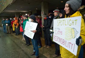 Residents of the Battery and their supporters protest against nuisance lighting Monday at St. John’s City Hall.

Keith Gosse/The Telegram