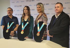 Millbrook First Nation Chief Bob Gloade (left), Ella Scothorn, Tayla Fern Paul and NAIG President George "Tex" Marshall standing with the NAIG 2023 medals.