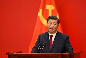 China's President Xi Jinping speaks after introducing members of the Chinese Communist Party's new Politburo Standing Committee, the nation's top decision-making body, in the Great Hall of the People in Beijing on October 23, 2022. (Photo by Noel CELIS / AFP) 