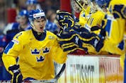  Sweden player #22 Mikael Backlund celebrates his goal with the bench in the third period as Sweden beat Slovakia in the first semi-final World Junior Championship game at Scotiabank Place in Ottawa, Ont. on Jan. 3, 2009.