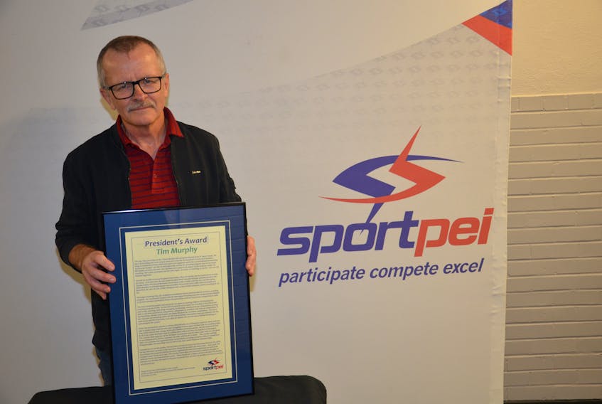 Tim Murphy is one of two recipients of the Sport P.E.I. President’s Award, which was presented recently at the Sport P.E.I. Awards ceremony in Charlottetown. Murphy has a long association with wrestling on P.E.I. Jason Simmonds • The Guardian