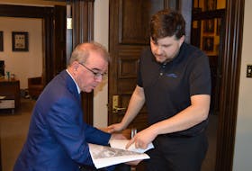 Charlottetown Mayor Philip Brown, left, and Scott Adams, manager of public works, discuss initial plans for the Eastern Gateway Master Plan will begin this year. Dave Stewart • The Guardian