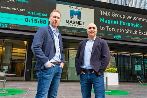 Magnet Forensics Inc founders Adam Belsher and Jad Saliba outside the Toronto Stock Exchange on May 3, 2021 for the company's IPO. 