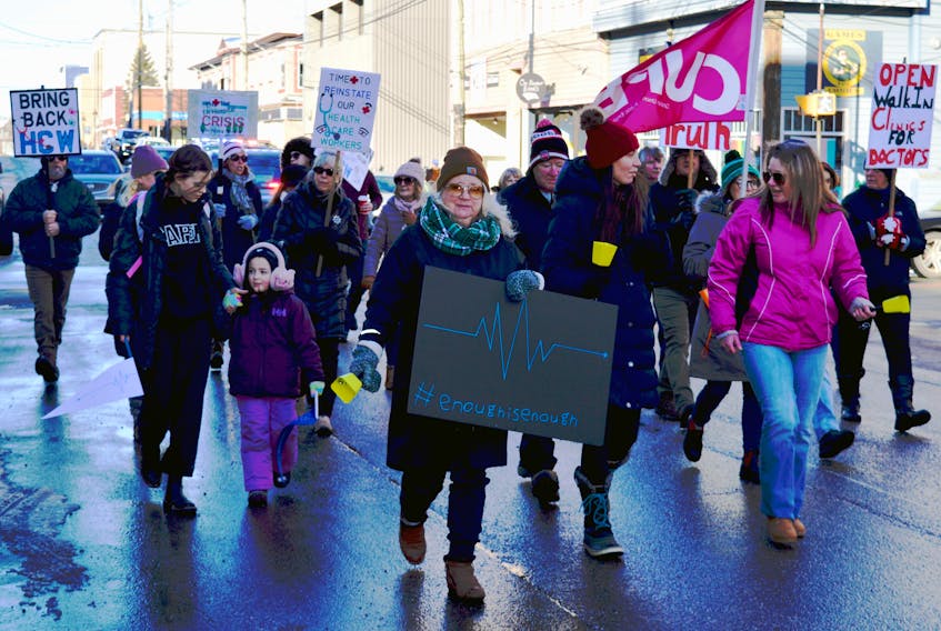 Upwards of 100 people walked down Charlotte Street to show their support for a March of Concern for Nova Scotia's Healthcare System on Sunday. IAN NATHANSON/CAPE BRETON POST