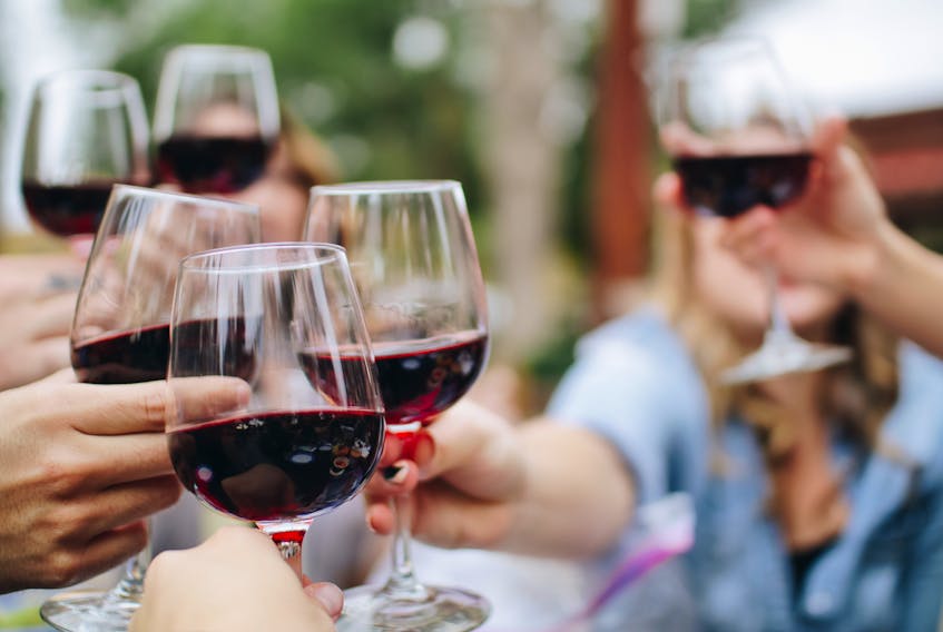 Trying new wines with friends and discussing them together can help build knowledge and appreciation of one’s preferences and can be a way to keep costs down if sharing a more expensive bottle. Kelsey Knight photo/Unsplash