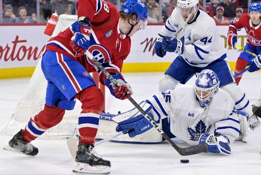 Toronto Maple Leafs goalie Ilya Samsonov makes a save against Montreal Canadiens forward Christian Dvorak during the second period at the Bell Centre. 