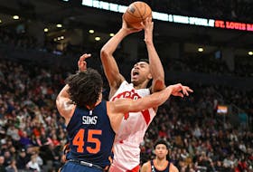 Raptors forward Scottie Barnes shoots over New York Knicks centre Jericho Sims at Scotiabank Arena on Sunday. Barnes is looking every bit — and more — like the player he was a year ago when he earned rookie of the year honours.