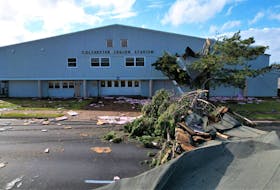 Debris is scattered outside the front of the Colchester Legion Stadium in Truro after Fiona wreaked havoc on the building.