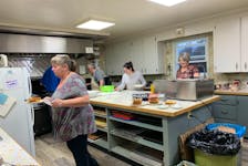A family of volunteers help out in the kitchen at the Barrington & Area Lions Club monthly breakfast on Jan. 14. From left: Tonya Ryer, her daughter Terri Ryer and sister Lisa Ross were among the 15 or 20 Lions members and community volunteers lending a hand cooking, serving, and cleaning up for the club’s monthly fundraiser. KATHY JOHNSON