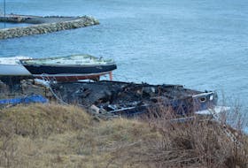 Fire destroyed a cabin cruiser at the Northern Yacht Club in North Sydney Sunday night. GREG MCNEIL/CAPE BRETON POST