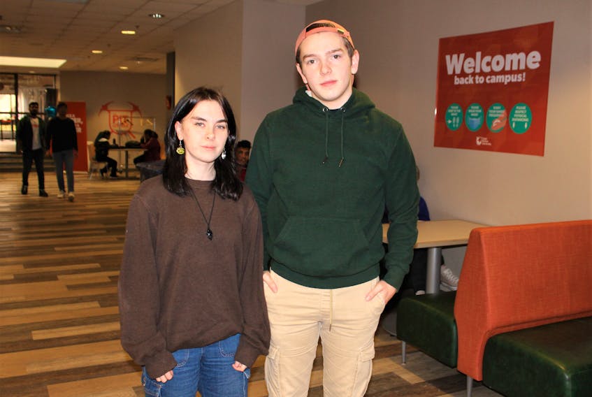 Cape Breton University first year students Sunni MacKenzie, left, and Maverick McDougall are concerned about how the looming faculty association strike will impact their coursework and marks. NICOLE SULLIVAN/CAPE BRETON POST